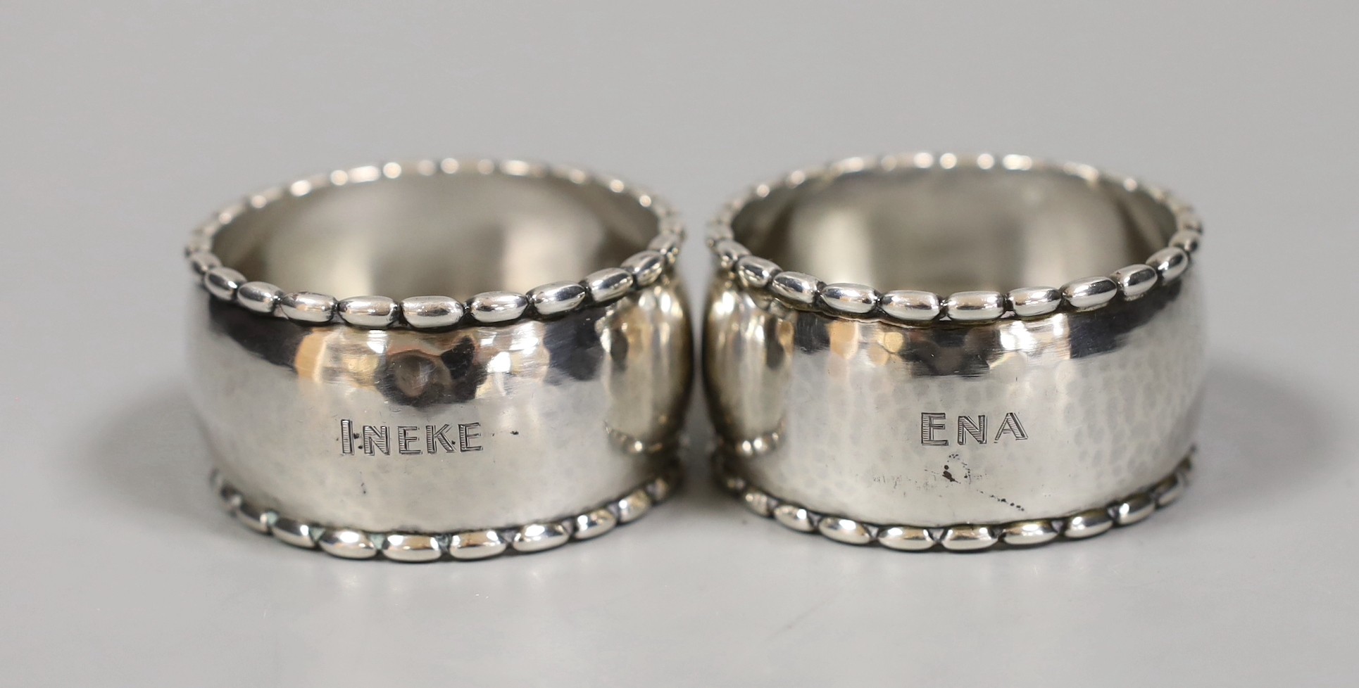 A pair of Georg Jensen sterling napkin rings, numbered 30D, 54mm.